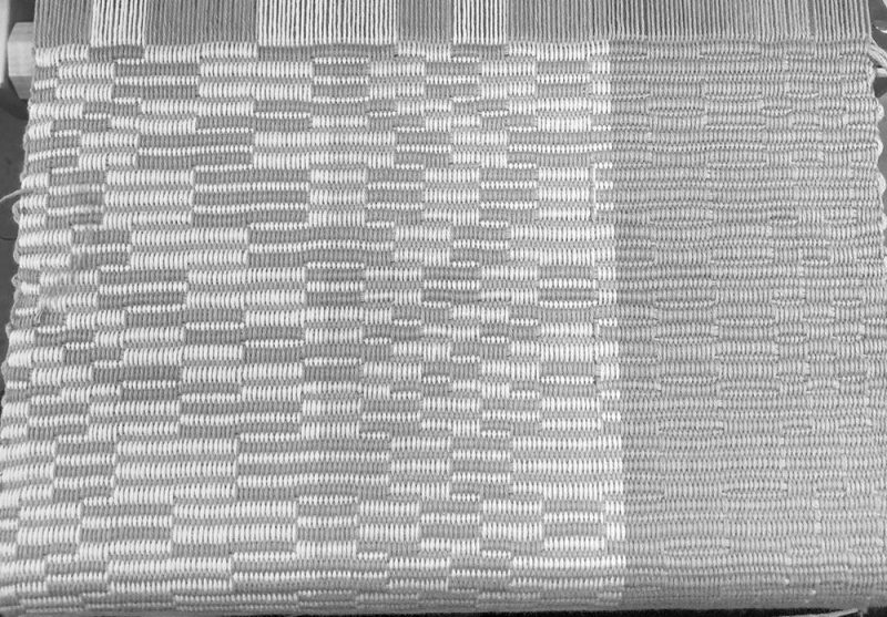 Handwoven repp weave sample, seen in black and white