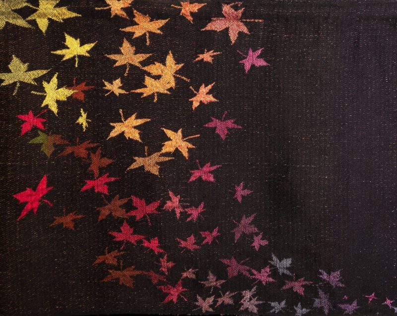 a photo of the first half of Seasons of Creativity, showing the falling leaves