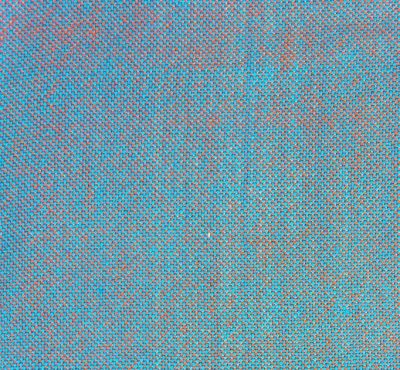 cyan and orange woven into a blue-gray plain weave swatch