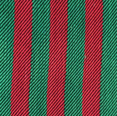 Red and green as warp stripes in a 3/1 twill swatch, black weft